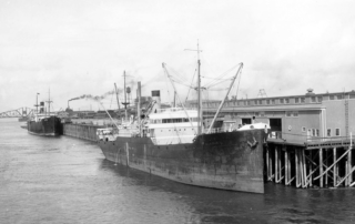 Historical photo of a docked ship at Terminal 1 in Port of Vancouver