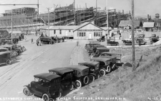 Historical photo of a wood shipyard at Port of Vancouver